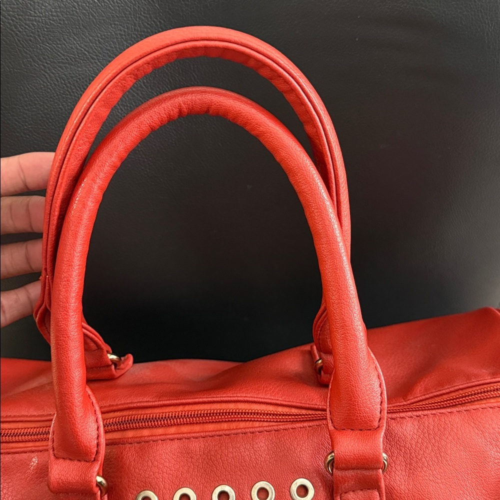 CAPRESE Stylish Red Handbag with Eyelet Design - Picture 8 of 16